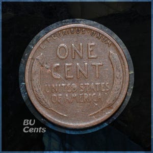 May include: A copper-colored United States one-cent coin. The coin features the words "ONE CENT" in the center, with "UNITED STATES OF AMERICA" below. The text "E PLURIBUS UNUM" is arched above. The coin is set against a dark background with the text "BU Cents".
