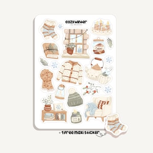 Könnte beinhalten: Ein Stickerbogen mit winterlichen Illustrationen. Designs umfassen einen Pullover, Socken, eine Teekanne, eine Fensterszene, ein Glas Kekse, eine Kerze, einen Stuhl und einen Stapel Bücher. Der Text "Cozy Winter" steht oben.