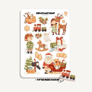 Könnte beinhalten: Ein Stickerbogen mit verschiedenen weihnachtlichen Illustrationen. Der Bogen enthält den Weihnachtsmann in einem Schlitten, einen Elfen, ein Rentier, ein Mädchen, einen Zug, Geschenke und Lebkuchen. Der Text "Santa's Workshop" steht oben.