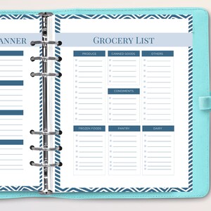 May include: A blue and white planner with a grocery list on the right page. The grocery list is divided into categories: produce, canned goods, others, condiments, frozen foods, pantry, and dairy. Each category has a list of blank lines for writing.