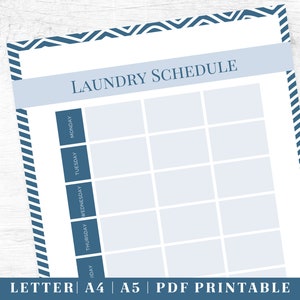 May include: Printable laundry schedule with a blue and white chevron border. The schedule is divided into days of the week, with space to write in laundry tasks.