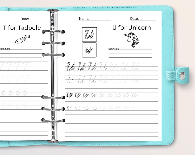 May include: A black and white workbook with lined pages for practicing writing the letter U. The page includes a picture of a unicorn and the words "U for Unicorn".