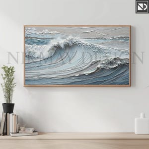 May include: A framed abstract painting of a large ocean wave with a layered, textured effect in shades of blue and gray.