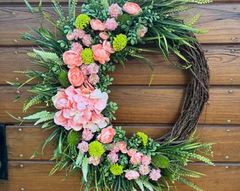 Beautiful spring wreath with optional sign. Peach/pink and green wreath for front door. Porch decor with tropical vibes.