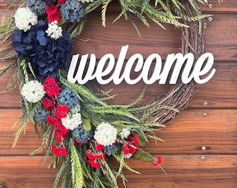 Patriotic wreath for front door. Red, white and blue porch decor to celebrate Memorial day or 4th of July in style. Americana decor