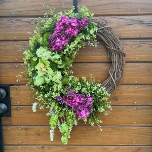 Best selling spring wreath for front door. Lilacs, hydrangeas, orchids and artichokes. Year round wreath outdoor.