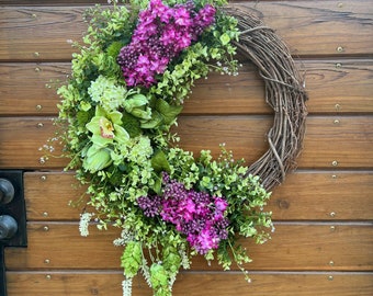 Best selling spring wreath for front door. Lilacs, hydrangeas, orchids and artichokes. Year round wreath outdoor.