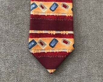 Reserve silk tie form the 90s - burgundy/orange stripe and geometric design