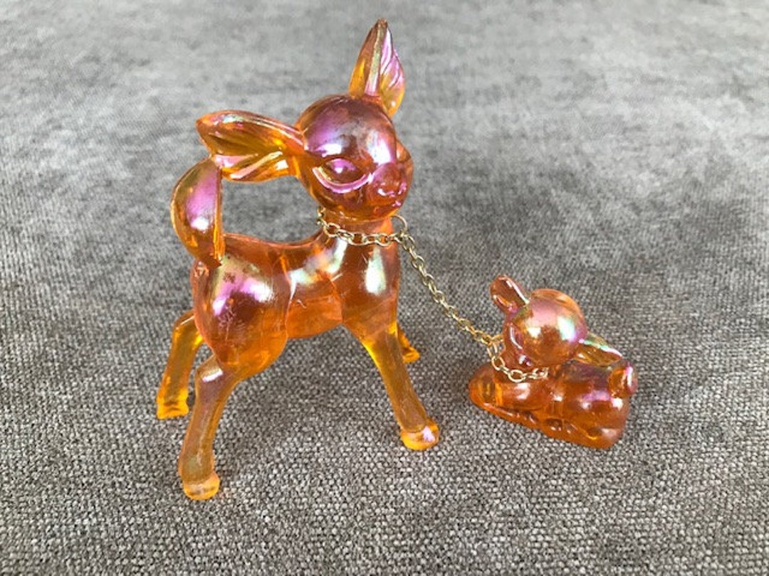 オレンジ色のプラスチック製の虹色のバンビの置物 - Etsy 日本