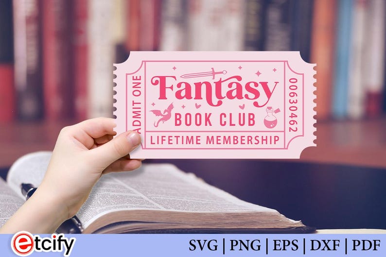 May include: A pink ticket with the words "Fantasy Book Club Lifetime Membership" in a decorative font. The ticket has a serrated edge and is held over an open book. The background is a blurred image of bookshelves.