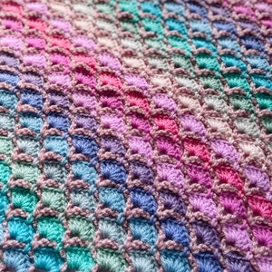 Motif de point de coquille d'un coin à l'autre