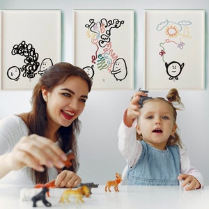 May include: A woman and a young girl are playing with toy animals. The girl is holding a grey toy aeroplane. The woman is holding a brown toy animal. There are three framed drawings on the wall behind them.