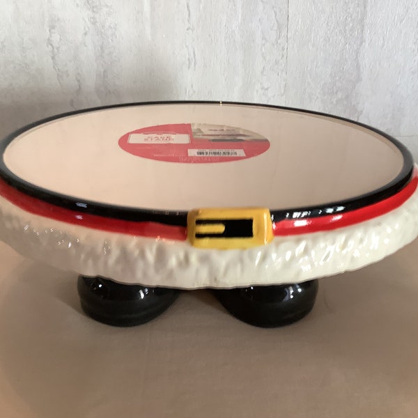 Vintage Holiday Time Santa pattern white, black, red and yellow ceramic cake stand with Santa belt and boots