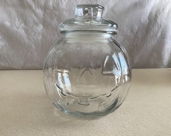 Vintage Libbey Glass Company of Canada clear glass Jack O’ Lantern shaped cookie or candy jar with lid.  Lid has the seal.