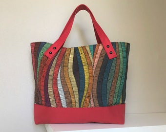 Tote bag carried by hand