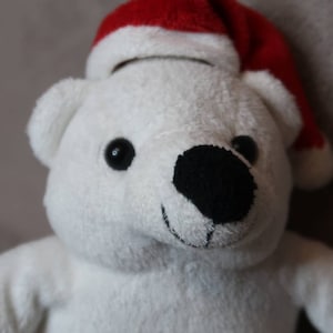 Polar teddy bear in a red Christmas hat. Stuffed animal toy. Memory bears. Made in Germany. Vintage Santa Bear Plush. Bear plushie.
