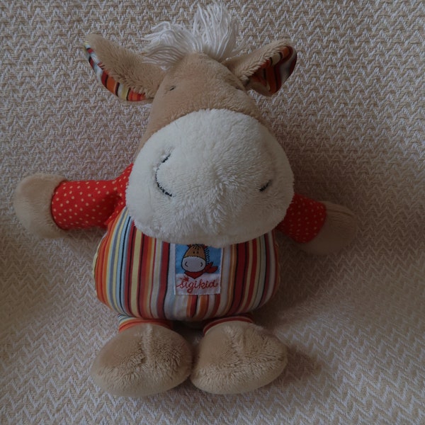 Vintage Sigikid plush hanging horse from the 80-90s. Adorable with red polka dot scarf & embroidered horse picture. Musical element inside.