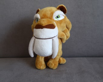 Diego Plush Ice Age – Saber Tooth Tiger Smilodon Stuffed Animal, 22 cm (8.5 in), Orange & Beige, Continental Drift Collectible, Soft Toy Gif