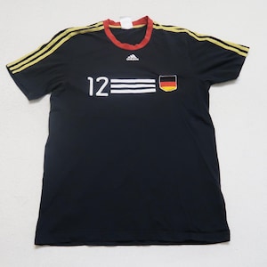 Germany National Team Soccer Jersey 2010 – Adidas Away, Size L, Cotton, Short Sleeve. Rare & Collectible Apparel. Perfect for football fans.