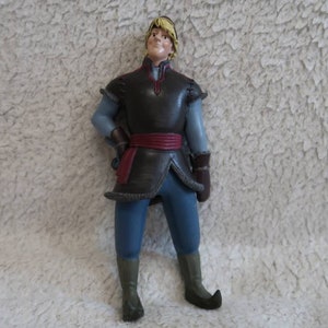 Bevroren. Walt Disney Animatiestudio's. Plastic beeldje stripfiguur. De hoofdpersoon is Kristoff Bjorgman. Bullebak. Handgeschilderd.