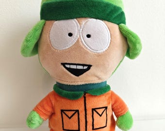 Kyle Broflovski Plush – South Park Play by Play Officially Licensed Soft Toy, 29 cm, Orange Parka Green Ushanka, Collectible Character Gift