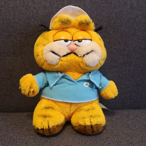 Garfield plush. Cat stuffed animal. Vintage 80s. Collectible Toy. Yellow, 21 cm. Very good condition. Authentic Comic Toy. Gift for a child.