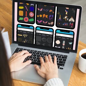 May include: A person is using a laptop computer to browse through a collection of digital graphics and stickers. The laptop screen displays a variety of colorful and whimsical designs, including flowers, geometric shapes, and cartoon characters. The person's hands are visible on the keyboard, indicating that they are actively searching for the perfect graphic.