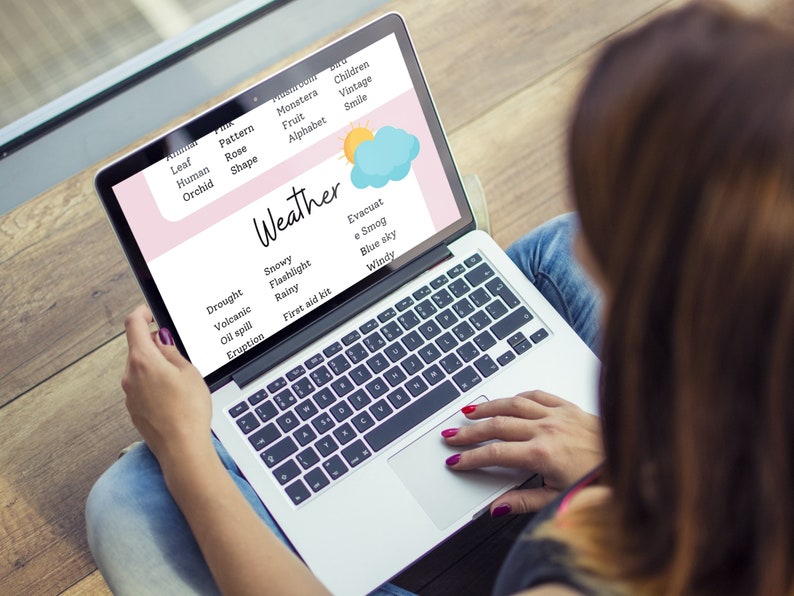 May include: A laptop computer screen displaying a list of weather-related terms, including "Snowy", "Flashlight", "Rainy", "First aid kit", "Evacuate", "Smog", "Blue sky", and "Windy". The screen also shows a cartoon image of a sun and a cloud.