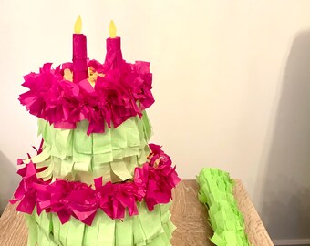 Unique handmade two-tier birthday cake pinata filled with 50+ assorted sweets. Available in many colours at buyers request.