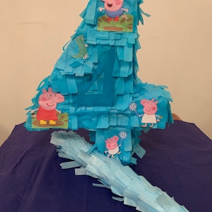 Beautiful handmade number 4 birthday  piñata to brighten up any party.