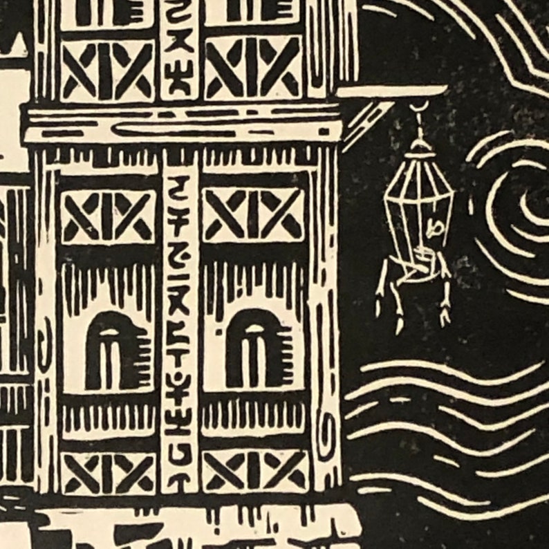 May include: Black and white woodcut print of a building with a lantern hanging from the side. The building has a series of windows and a decorative pattern on the front.