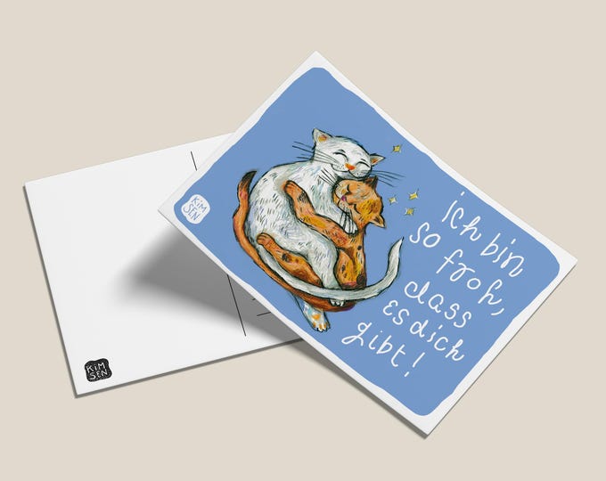 Postcard with a cuddling pair of cats