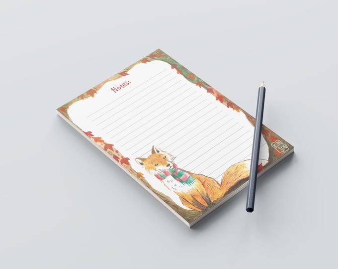 Elongated notepad with a fox in an autumnal setting