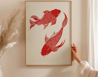 May include: A framed print of two red koi fish swimming in opposite directions against a white background.