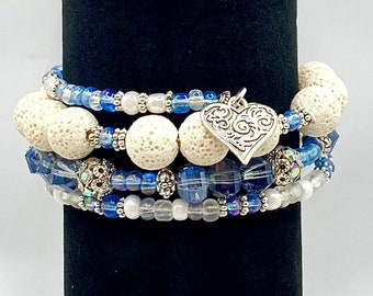 Memory wire bracelet in white lava stone, blue/white seed beads. Summer wrap in rhinestone filigree beads/boho wrap with heart/flower charms