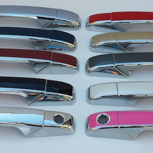 May include: A set of 12 car door handles in various colors, including silver, black, red, beige, gray, white, and pink. The handles are made of chrome and have a modern design.
