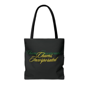 May include: Black tote bag with a green and yellow design that says "Chums, Incorporated".