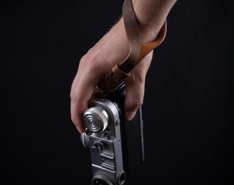 Correa de cuero para cámara: un regalo minimalista para fotógrafos