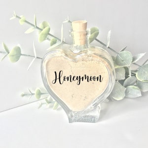 Wedding… Honeymoon sand heart bottle jars… can say honeymoon or your destination