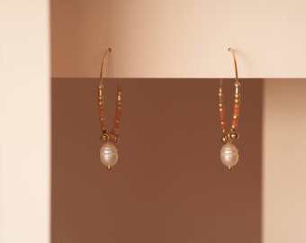 Gold-filled gold hoops and miyuki and gold glass beads and mother-of-pearl pendant
