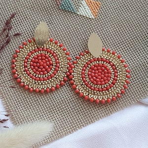 Hand-woven pearl earrings with golden miyuki and coral orange glass beads, boho chic style
