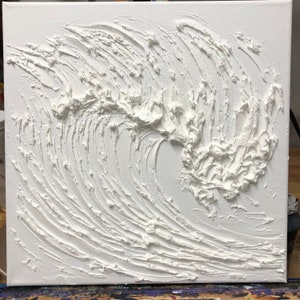May include: White textured paint on canvas creates a wave-like abstract design. The paint is thick and creates a 3D effect.