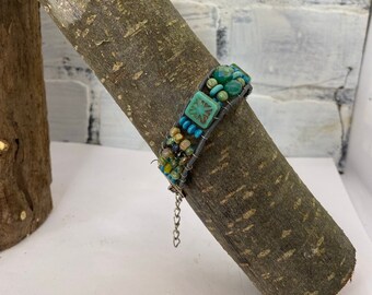 Teal leather and beaded bracelet