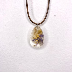 Resin pendant with Real pressed flowers on a cord necklace