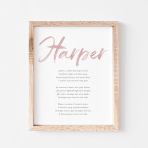 May include: A printable art print featuring a pink watercolour design of the name Harper. The print includes a poem about the name Harper, describing it as a melody, a beacon of light, and a source of joy.