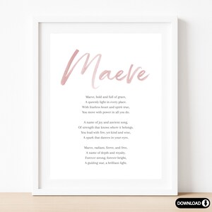 May include: A framed print with the name "Maeve" in a soft pink script. The print includes a poem about the name Maeve, with lines like "bold and full of grace" and "a guiding star, a brilliant light."