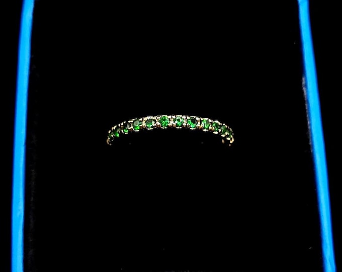 Yellow gold tsavorite garnet ring. Solid 14k yellow gold band in size 7.5us set with natural garnets. Stackable engagement ring wedding ring