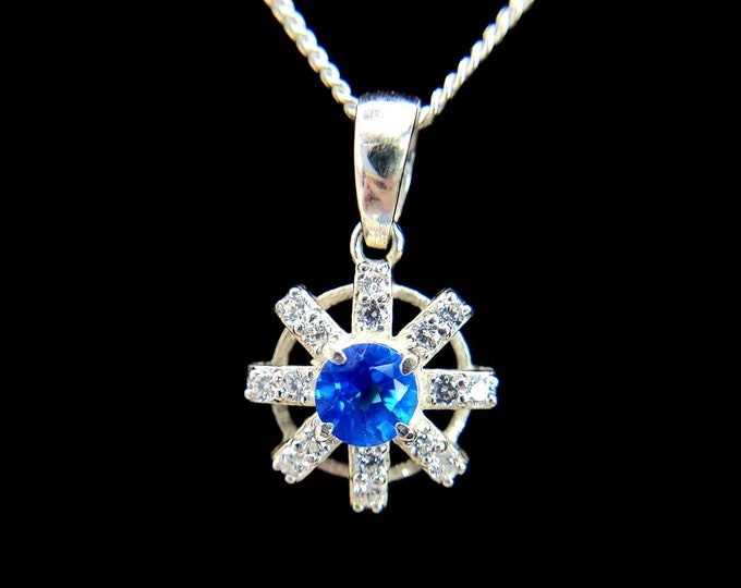 Azotic topaz pendant, set in sterling silver. Pendant only, chain options available in variation