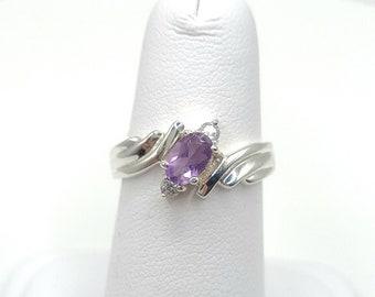 Natural amethyst and silver ring. Genuine amethyst, purple gemstone ring, sterling silver, cz, cubic zirconia accents, size 6 womans ring