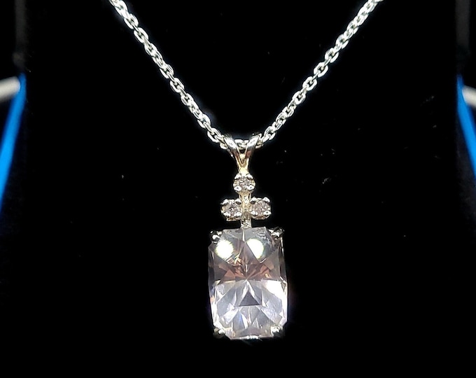 Rose quarts and genuine pink diamond necklace. set in sterling silver. Pendant only, chain options available in variation